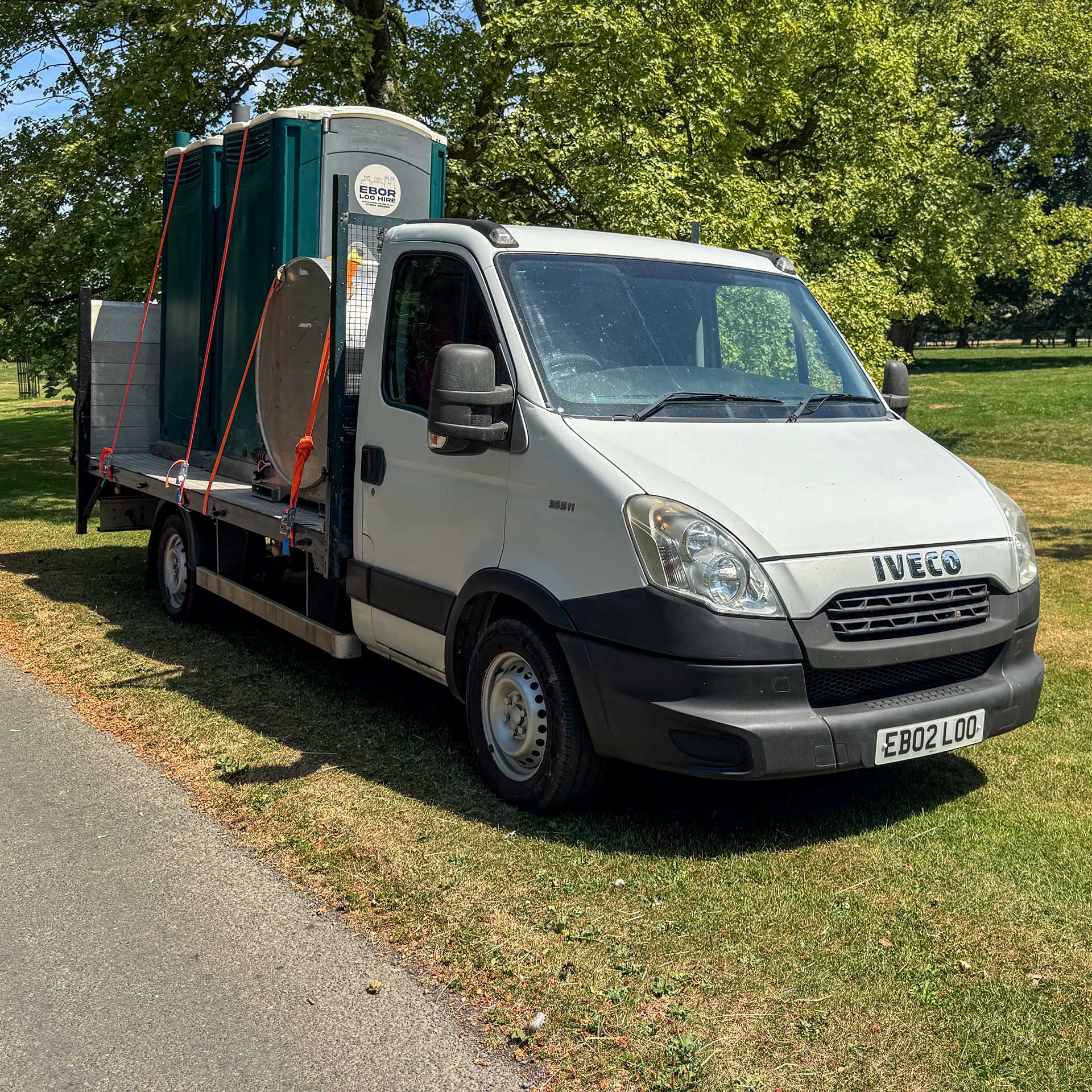 Delivering portable toilets to event site.